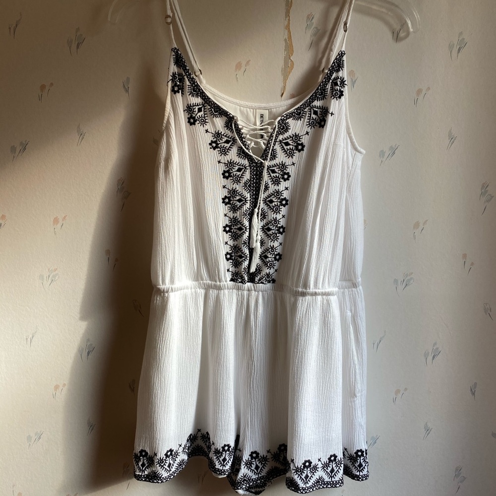 white and black romper